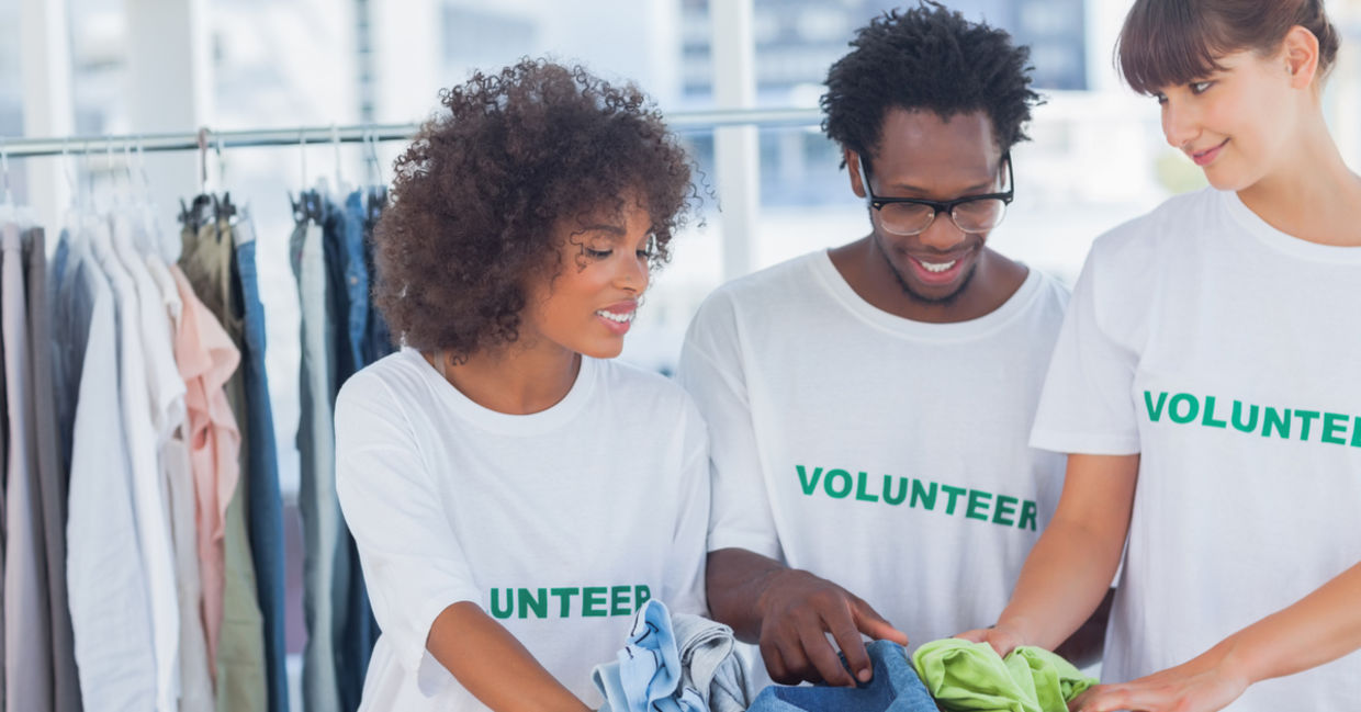 Volunteers taking clothing donations Volunteers taking clothing donations