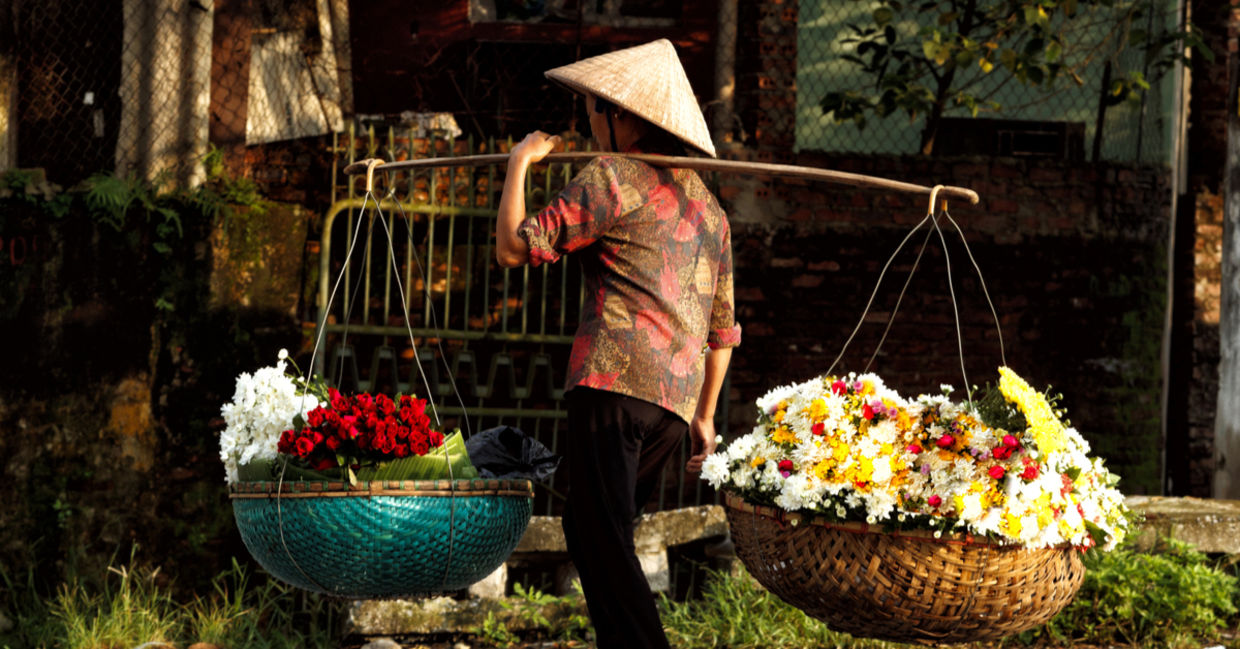 A vendor on the streets of Hanoi A vendor on the streets of Hanoi
