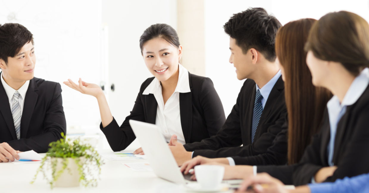 Japanese workers at a meeting look happy and more refreshed, an outcome of a 4 day work week. Japanese workers at a meeting look happy and more refreshed, an outcome of a 4 day work week.