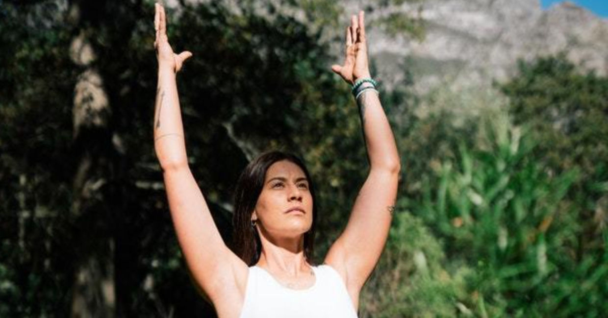Woman in the kemetic yoga Ka pose Woman in the kemetic yoga Ka pose