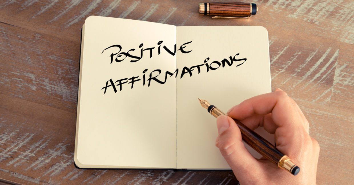Writing down positive affirmations. Writing down positive affirmations.