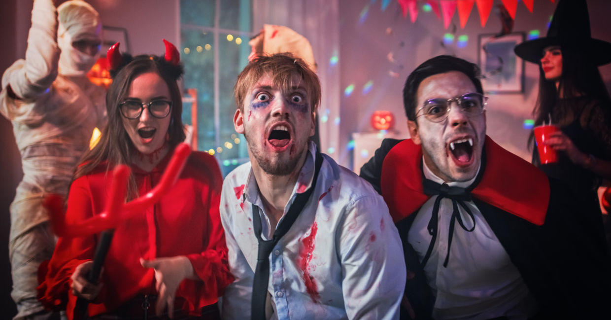 Monster costumes at a Halloween party. Monster costumes at a Halloween party.