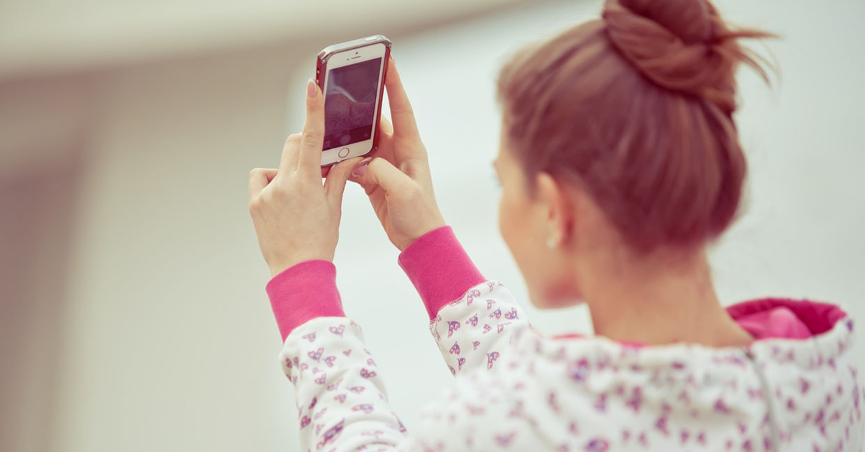 Girl taking a selfie. Girl taking a selfie.