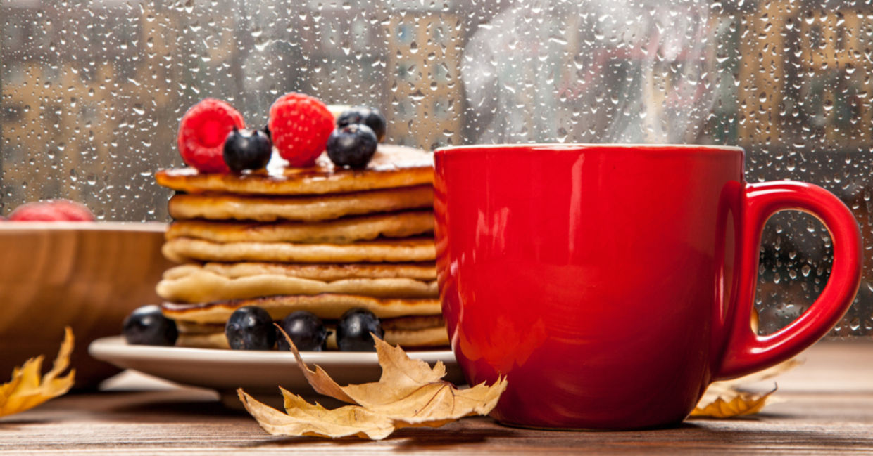 Enjoying a plate of pancakes and a mug of steaming coffee is a gezellig way to spend a rainy day. Enjoying a plate of pancakes and a mug of steaming coffee is a gezellig way to spend a rainy day.