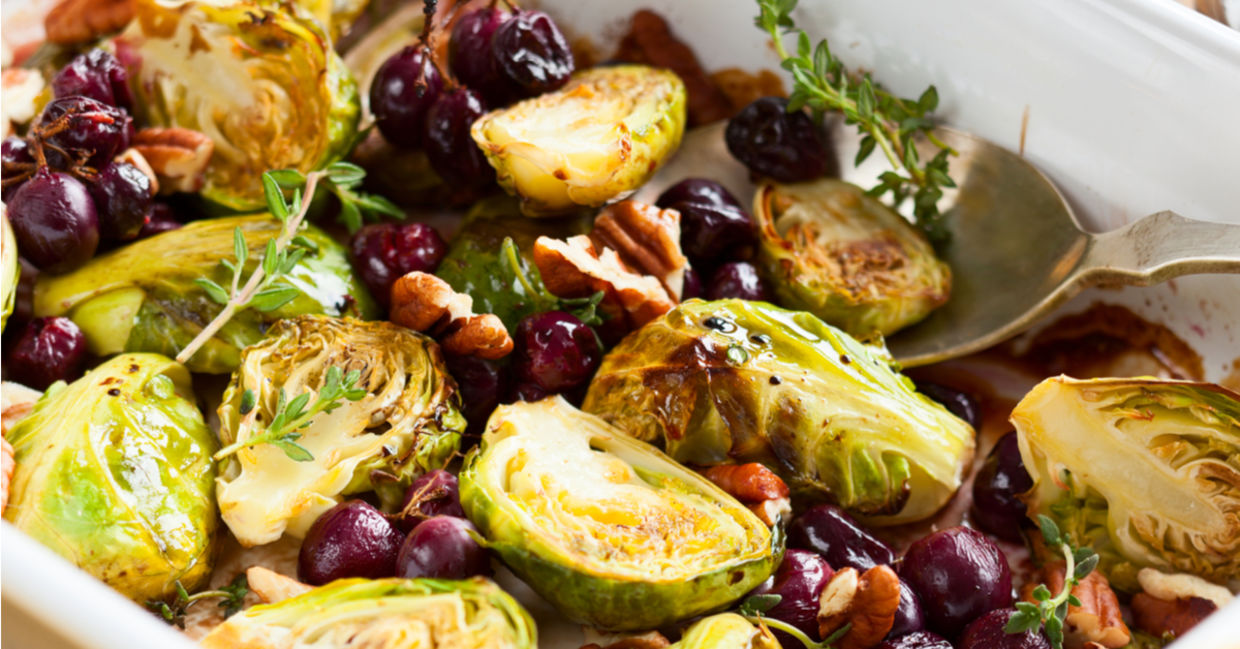 Roasted brussels sprouts served with grapes and nuts. Roasted brussels sprouts served with grapes and nuts.