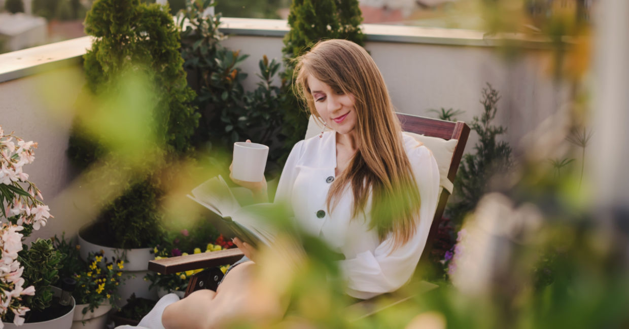 Woman surrounded by greenery. Woman surrounded by greenery.