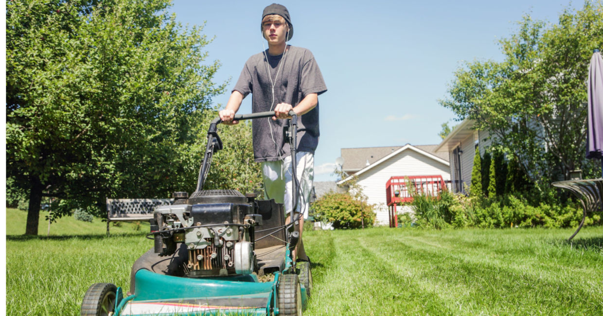 Teen cutting grass for people in need. Teen cutting grass for people in need.