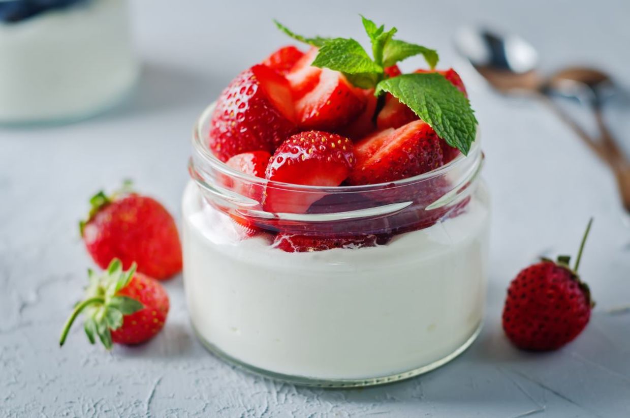 Greek yogurt with strawberries is a healthy breakfast. Greek yogurt with strawberries is a healthy breakfast.