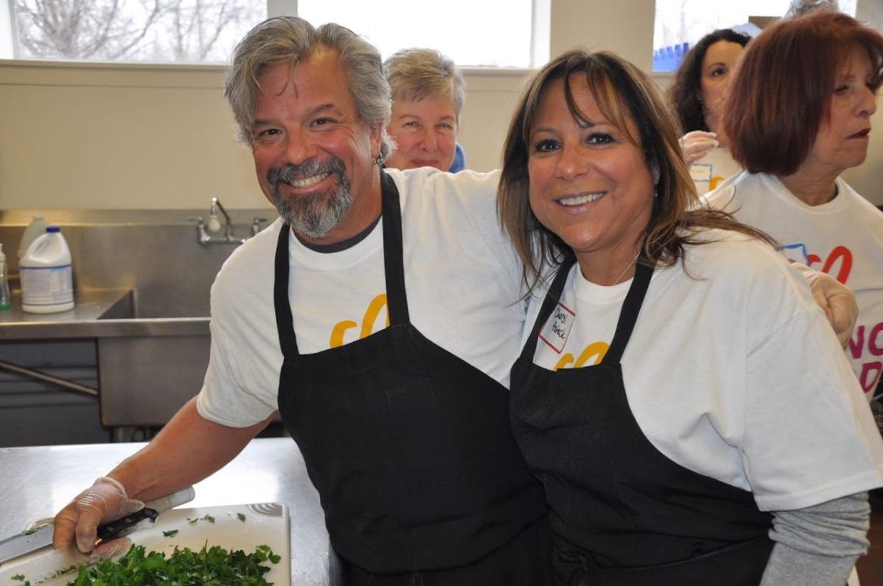 Preparing a meal on Good Deeds Day. Preparing a meal on Good Deeds Day.